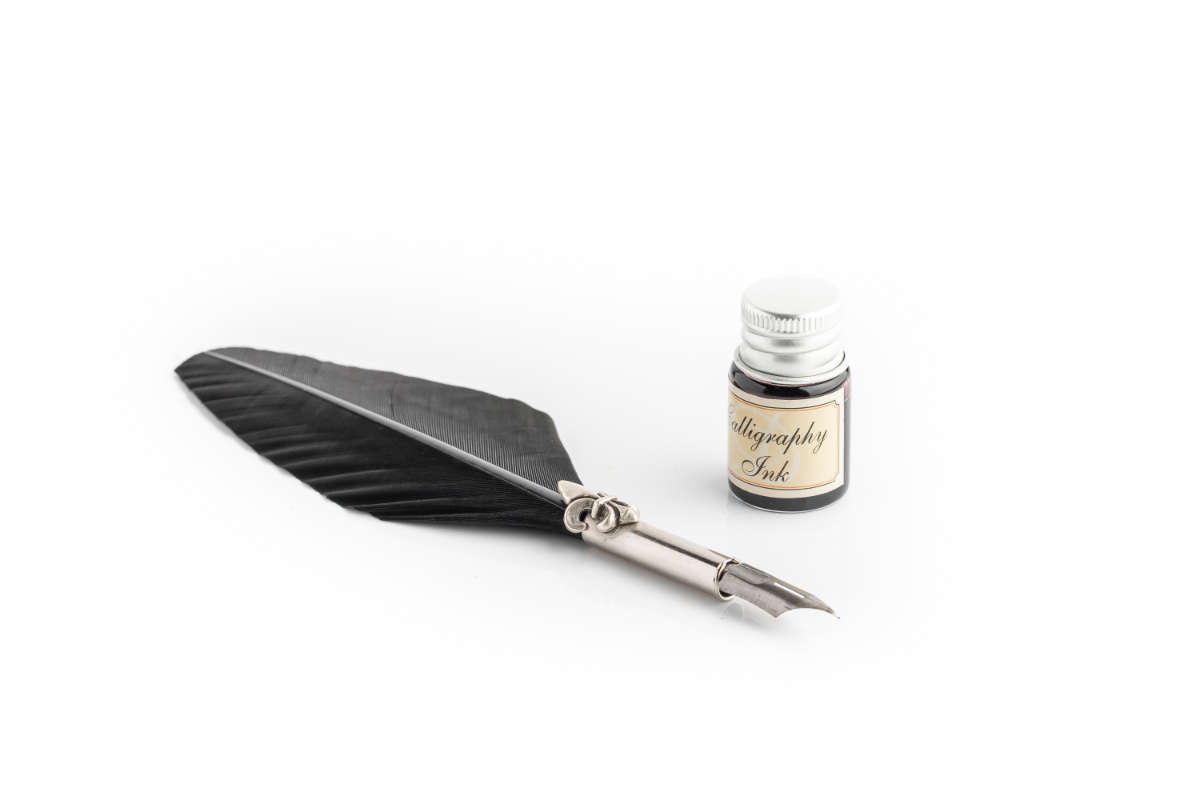 Writing set with black large feather pen, lily decorated ferrule & black ink